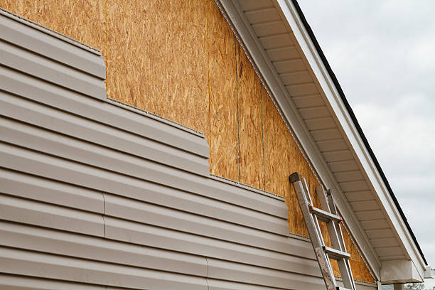 Professional Siding Contractor technician working in Newtown, VA